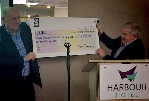 ISA President David Lovegrove presents ICRA Commodore Norbert Reilly with cheque